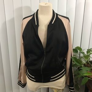 Soft pink and black bomber jacket
